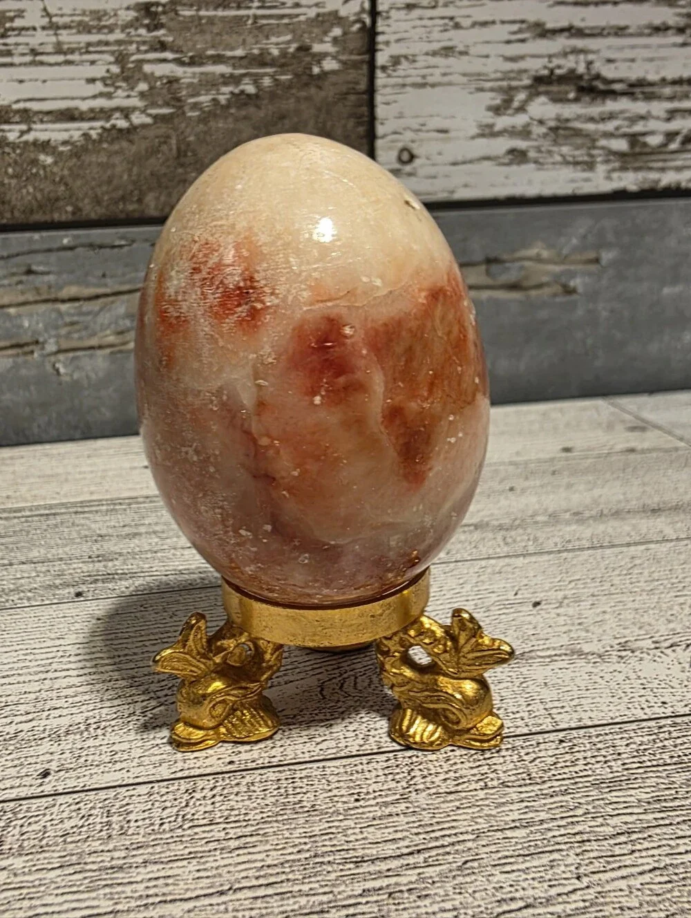 Natural Orange and Cream Egg Stone Decor on Gold Stand - Home Accents